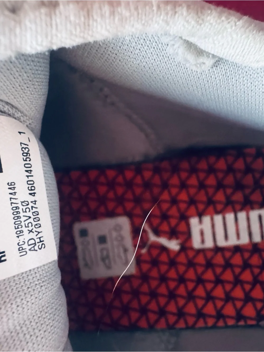 Puma White Trainers with Red Outsole Detail